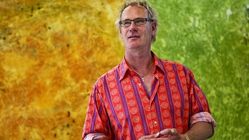 Andrew Mallard standing in front of one of his artworks in 2009. Credit- Lee Griffith